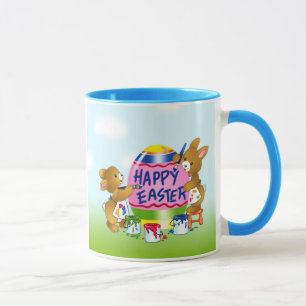Glad påskkaniner som dekorerar ägg mugg