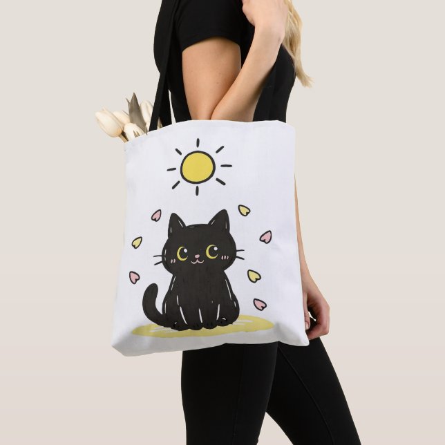 Glad svart katt solsken tygkasse (Närbild)