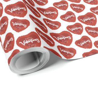 Glad valentinehjärta på vitt presentpapper