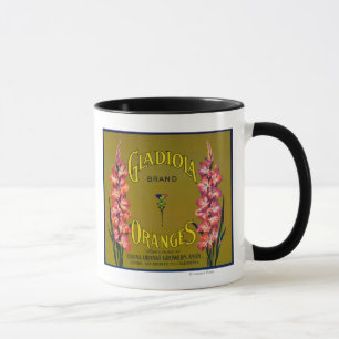 Gladiola brännmärker den citrusa lådaetiketten mugg