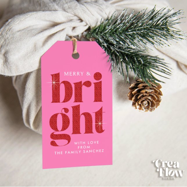 Glam Red Sequin Merry och Bright jul Presentetikett (Christmas gift tag with red sequin-like text `Merry and Bright´ on a Pink background. )