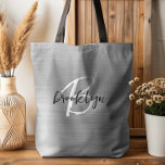 Glam Silver Brushed Metall Black White Monogram Tygkasse<br><div class="desc">Den här elegantens personlig till väskan har ett monogram och första namn i det moderna svartvita skript på en glam silver borstad bakgrund i metall.</div>