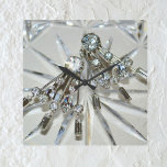 Glam Vintage Art Deco Rhinestones Acrylic Fyrkantig Klocka<br><div class="desc">Fotografibilden av vintage konst deco rhinestone örringar lägger till reflexglam till denna elegant och glamorös akrylväggklocka. Smycken med konditorivaror har en bakgrund av klippt kristaller. Det övergripande gråttet är ett silvret som verkar vara gnistra med av isigens blek blått. Det är slående och unikt och ett roligt sätt att lägga...</div>