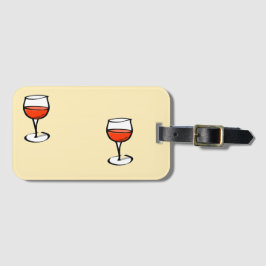 Glas från vin på orange bagagebricka