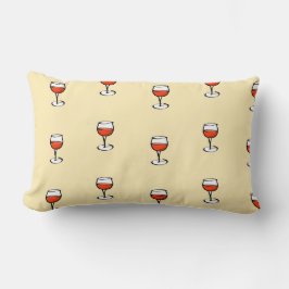 Glas från vin på orange lumbarkudde