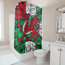 Glas som är fastsatt i vibrant Mosaic Welsh Flagga