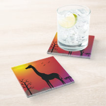 Glas underlägg med giraffe i solnedgången.
