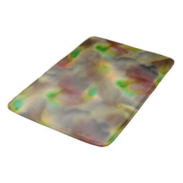 Glaset ser ut i rött och kalkgrönt på nyanser av g badrumsmatta