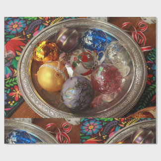 Glass ornaments in silver box with folk art presentpapper