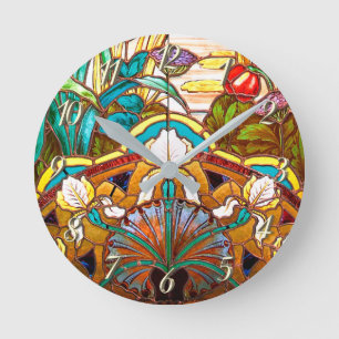 Glasutseende i art nouveau blommigt nedfläckad rund klocka
