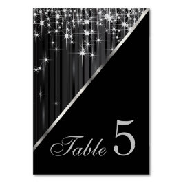 Glittrande svarta och silverfärgade stjärnljus bordsnummer