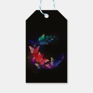 Gloing Neon Natt Butterflies på svart bakgrund Presentetikett