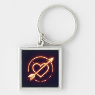 glowing image of a heart with cupid's arrow fyrkantig silverfärgad nyckelring