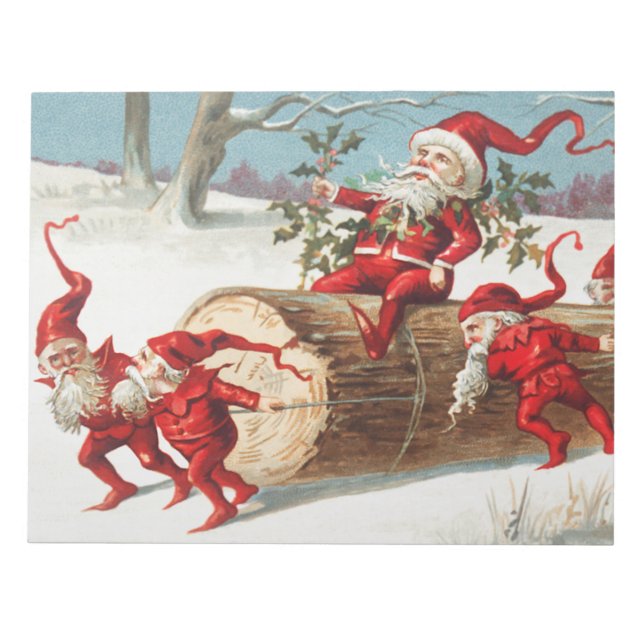 Gnomes dragging a cut tree trunk through the snow anteckningsblock (Framsida)