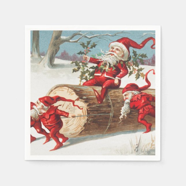 Gnomes dragging a cut tree trunk through the snow pappersservett (Framsidan)