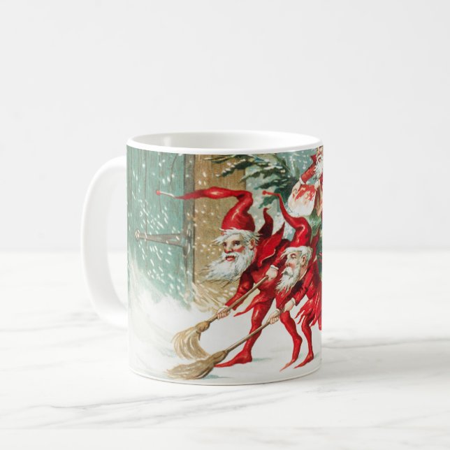 Gnomes sweeping snow with a broom kaffemugg (Framsida vänster)