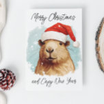 God jul Capybara Kort<br><div class="desc">Den här designen kan vara personlig om du väljer Redigera design. Du kan också överföra till andra objekt. Kontakta mig på colorflowcreations@gmail.com eller använda alternativet chatta överst på sidan om du vill ha den här designen på en annan produkt eller behöver hjälp med den här designen. Se mer av mina...</div>