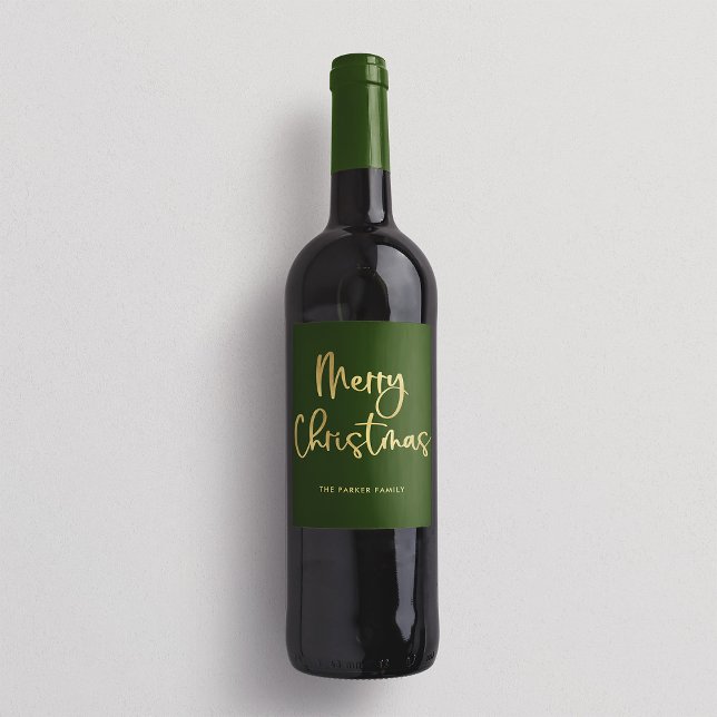 God jul | Faux Guld Avslappnad Script på Grönt Vinflaska Etikett (An elegant green Christmas wine label with faux gold script)