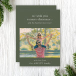 God Jul | Foto för Mörk grönt Elegant-familj Julkort<br><div class="desc">Ett modernt fotoplatt i eleganten Julhälsningar kort med ett klassiskt typografiskt citat: "Vi önskar dig ett god jul.."och det lyckligaste nya året!" i vitt. Utformningen har en funktion för grönt av mörk i skogen färg. Fotot, hälsning och namn kan enkelt anpassas efter en så unik design som du. En snyggt,...</div>