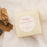 God jul & Guld Heart Cream Helgdag Runt Klistermärke<br><div class="desc">God jul & Guld Heart Cream Helgdag Round Stickers! Dessa minimalistiska klistermärken har en "god jul" hälsning överst på kortet, med "merry" skriven i elegantens manusgrafi, försedd med enkla blomningsfärger i vardera änden. Nedan finns ett sött guld-hjärta. Med din familj namn och året som visas nedan, lägger dessa klistermärken till...</div>