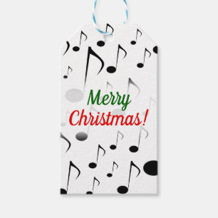 "God jul!", + Mönster för många musik noter Presentetikett