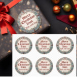 God jul runt klistermärke<br><div class="desc">En årgång julklapp för krans. Glöm inte att byta namn! Lägg till anpassningsbarnas ordalydelse i den här designen genom att använda rutorna "Redigera den här designmallen" på objektets höger eller klicka på knappen "Anpassa den" för att ordna texten, ändra typsnitt och färg och för att lägga till ytterligare information om...</div>