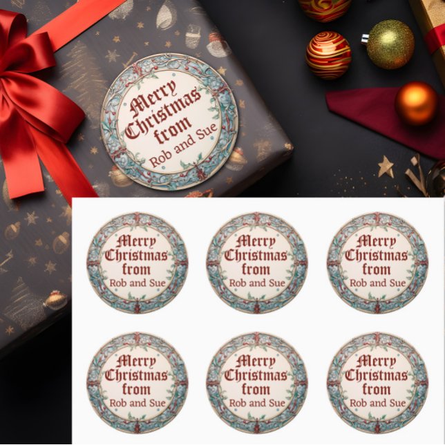 God jul runt klistermärke (A Christmas wreath gift label is shown attached to a gift and in a sheet of six.)