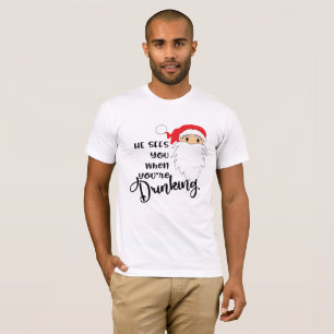 God jul ser han dig när du dricker t shirt
