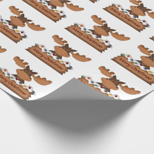 God julälg med julljus presentpapper