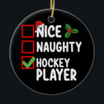 God Naughty Hockey-spelarens jullista Santa List Julgransprydnad Keramik<br><div class="desc">God Naughty Hockey Player-jullista Santa Helgdag</div>