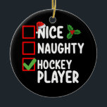 God Naughty Hockey-spelarens jullista Santa List Julgransprydnad Keramik<br><div class="desc">God Naughty Hockey Player-jullista Santa Helgdag</div>