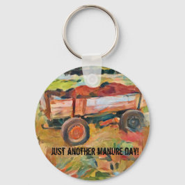 Gödselvagn på landsbygden, A.I. förbättrad foto Nyckelring