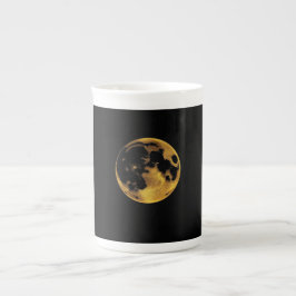 Gold textured moon on dark black benporslin mugg