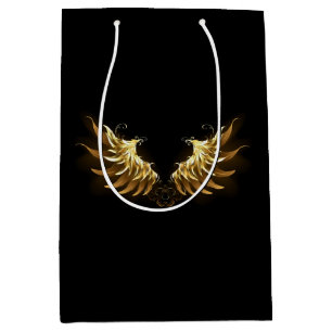 Golden Angel Vingar på svart bakgrund