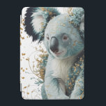 Golden Bloom Koala iPad Mini Skydd<br><div class="desc">En serene koala, krökt med eterisk flora och kyld av gulddamm, sitter som den milda väktaren av en drömliknande skog. I biet förenas vilda livsmönster med fantasifull surrealism och man firar naturen med elegans och magi. Hyperrealistiska päls med stiliserad fantasi inslag Soft pastel palett som punkterats av guld-präglingar Idealisk för...</div>