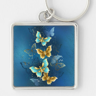 Golden butterflies fyrkantig silverfärgad nyckelring