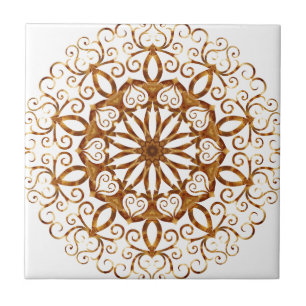Golden filigree flake på vitt kakelplatta
