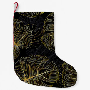 Golden monstera löv, romantisk sömlös blommigt. liten julstrumpa