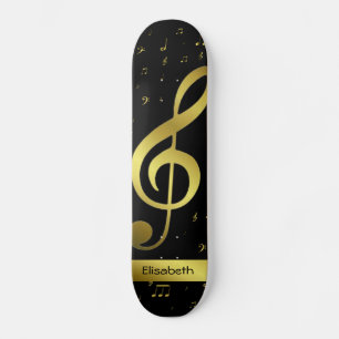 Golden musik noter i svart skateboard
