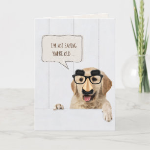Golden Retriever-hund på trä med mask Kort