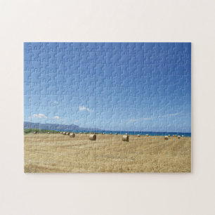 Golden Rolls of Hay and Deep Blue Sea Design Pussel