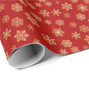 Golden snöflingor på röd bakgrund presentpapper