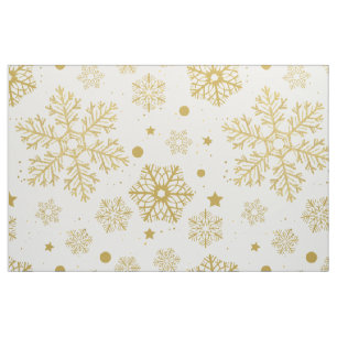 Golden snöflingor tyg