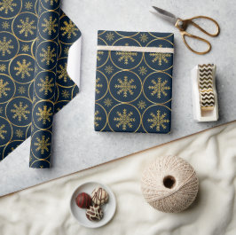 Golden Snowflake-julklapp som täcker pappra Presentpapper