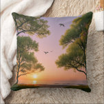 Golden Sunset Ocean Beach Landscape with Trees  Kudde<br><div class="desc">"Immerse yourself in the tranquility of this stunning sunset over the ocean. This beautiful landscape features lush green trees framing a golden sun dipping below the horizon,  with graceful birds soaring through a soft purple and orange sky</div>