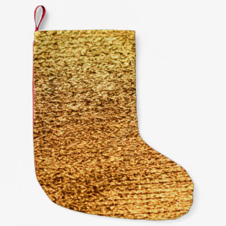 Golden Textil: glamorös makrobakgrund. Liten Julstrumpa