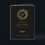 Golden Winter WandeBlack Helgkort<br><div class="desc">Elegant gyllene vinterkrans monogram,  Julhälsningar kort i klassisk svart. Kortfunktioner som matchar mönster i och många-mall linjer för anpassningsbarna hälsning.</div>