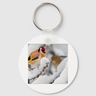 Goldfinch i snö nyckelring