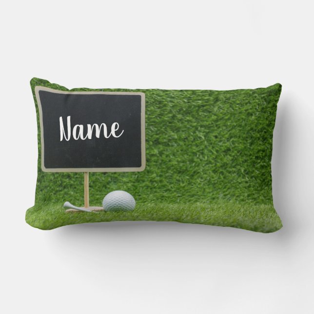 Golf-boll med blankkrita på grönt lumbarkudde (Framsida)