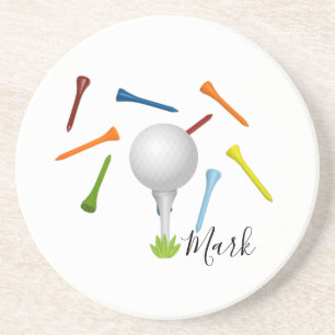 Golf boll och färgbeläggning på vitt underlägg